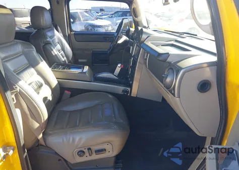 2003 Hummer H2 z USA, uszkodzony, nr VIN 5GRGN23U53H118205